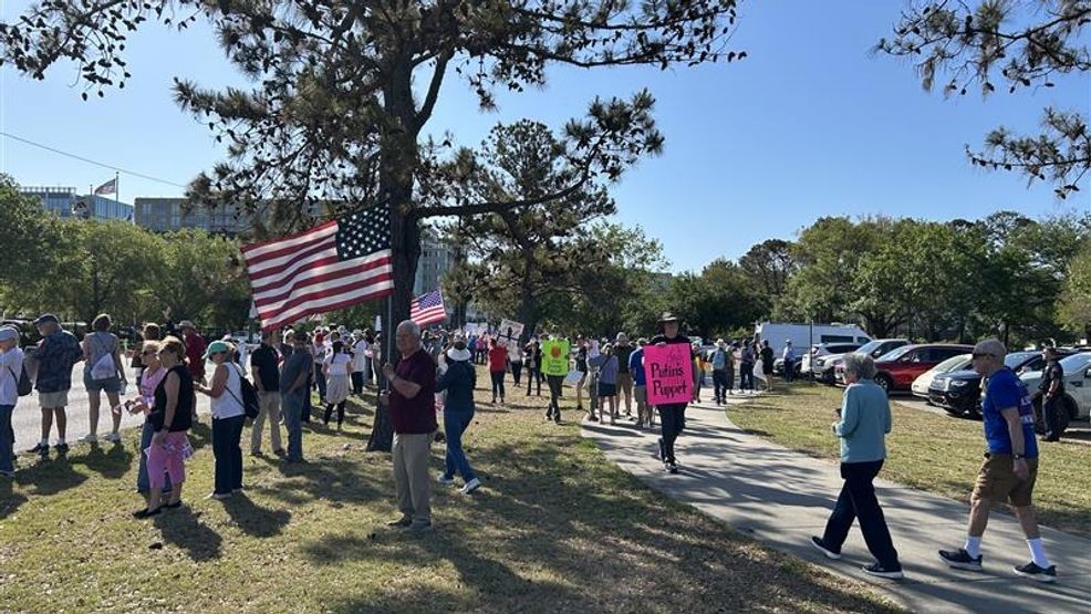 Image for story: PHOTOS: Estimated 1,000+ gather in Charleston to protest Trump administration Saturday