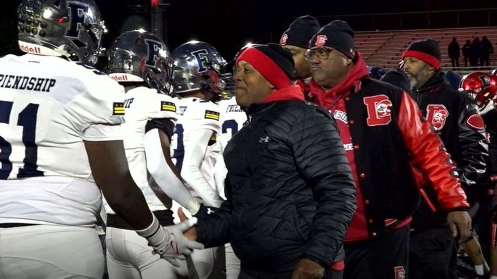 Image for story: D.C. crowns its champion, VA coming down to the wire in high school football