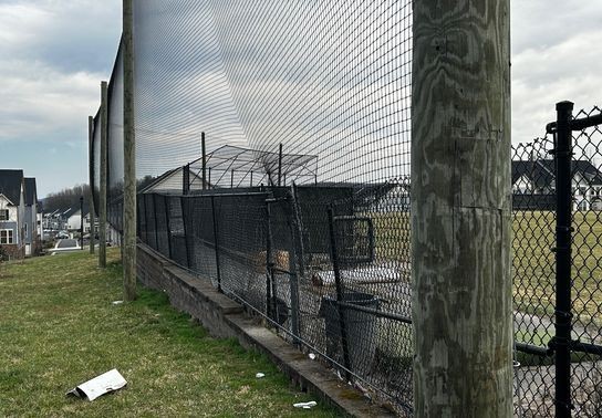 Image for story: Parents say foul balls from Oakdale High baseball field pose risk to nearby homes, traffic