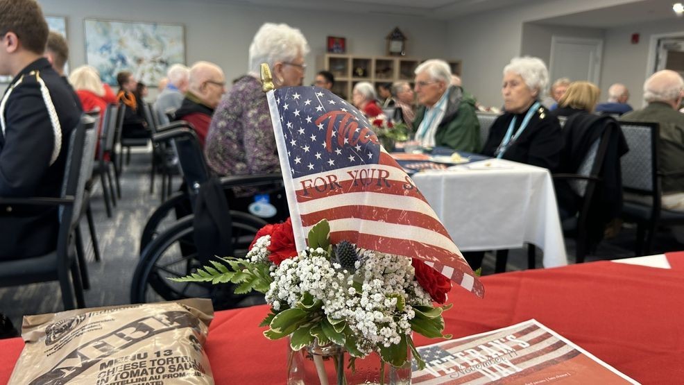Image for story: Senior living community, with dozens of retired GIs, celebrates Veterans Day